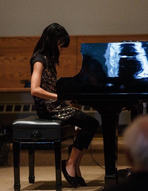MIKE DEAL / WINNIPEG FREE PRESS
Micah Angeli Buenafe performs in the Piano Solo, Canadian Composers, grade 1 class at Sterling Mennonite Fellowship on Dakota Street during the 99th annual Winnipeg Music Festival which goes until March 19th.
170312 - Sunday, March 12, 2017.