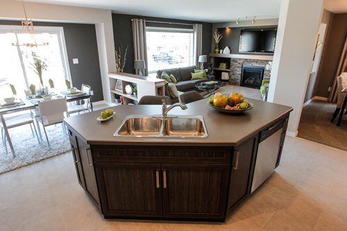 BORIS MINKEVICH / WINNIPEG FREE PRESS
HOMES - 7 Larry Vickar Drive East in Devonshire Village. View from the kitchen island that opens up to the kitchen table and living room.  March 13, 2017 170313
