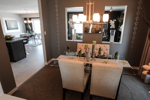 BORIS MINKEVICH / WINNIPEG FREE PRESS
HOMES - 7 Larry Vickar Drive East in Devonshire Village. The formal dining room opens up to the rest of house with lots of light. March 13, 2017 170313