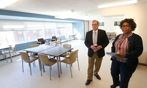WAYNE GLOWACKI / WINNIPEG FREE PRESS

 Titi Tijani, Manager of Tenant Services gives Families Minister Scott Fielding a tour Monday of the multi-purpose room at the grand opening of Ellice Place, an assisted living facility for seniors.  Families Minister Scott Fielding announced Ellice Place at 555 Ellice Ave, that combines social housing and assisted living services for seniors in Winnipeg has completed their  $11-million renovation. All 118 studio and one-bedroom units have been fully renovated, including five fully-accessible units for individuals with disabilities. Tenants are scheduled to move in on April 3.  see  provincial news release   March 13    2017