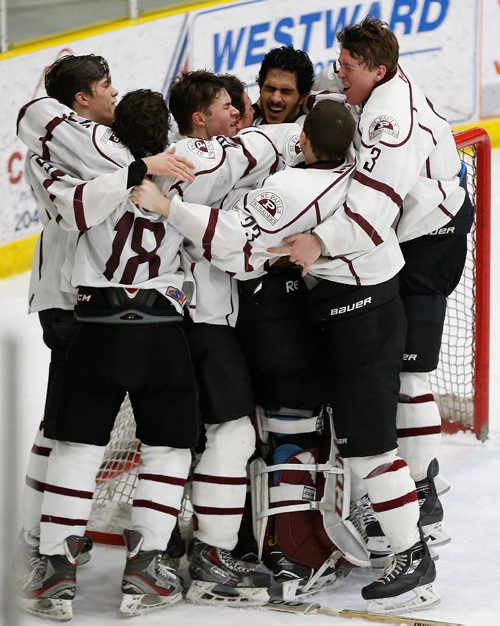 JOHN WOODS / WINNIPEG FREE PRESS
St Paul's Crusaders celebrate a win over the Vincent Massey Trojans in the Manitoba Boys High School Hockey Championship in Portage La Prairie Monday, March 13, 2017.