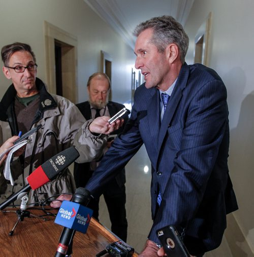 BORIS MINKEVICH / WINNIPEG FREE PRESS
Brian Pallister talks to the media at the leg outside room 204. March 17, 2017 170317