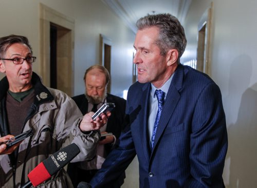 BORIS MINKEVICH / WINNIPEG FREE PRESS
Brian Pallister talks to the media at the leg outside room 204. March 17, 2017 170317