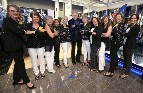 JASON HALSTEAD / WINNIPEG FREE PRESS

Fashion mogul Peter Nygard has some fun posing with breast-cancer survivor models, from left, Katherine Dane, Debbie Edkins, Wanda Anderson, Jodie Gale, Hedie Epp, Carol Graham, Roberta Smook, Lori Orchard, Charity Happychuk and Nancy Olson after the Nygard fashion show on March 17, 2017 at the Nygard Fashion Park store on Kenaston Boulevard. More than 450 people attended the show which previewed new spring fashions and raised funds for CancerCare Manitoba to support breast cancer research. (see Social Page)
