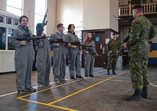 Canstar Community News March 14, 2017 - In perparation for their trip to Vimy Ridge to mark the battle's 100th anniversary, students and staff from Kildonan East and Miles Macdonell Collegiates received training from Canadian Army Reservists at the Fort Garry Horse (551 McGregor Ave.). (SHELDON BIRNIE/CANSTAR/THE HERALD)