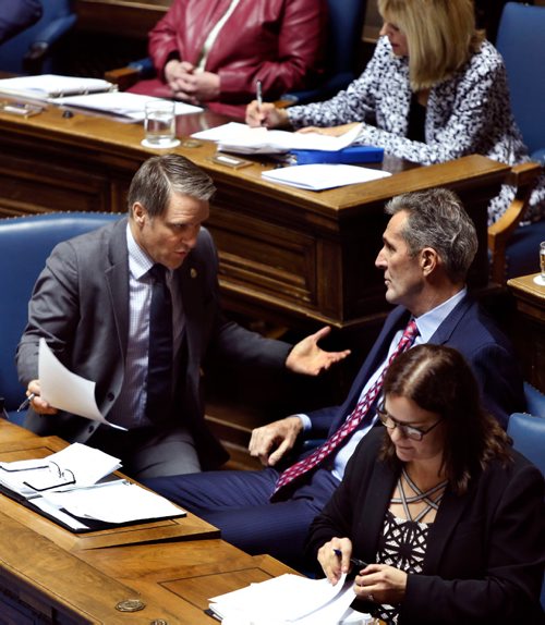 WAYNE GLOWACKI / WINNIPEG FREE PRESS

In centre,  Premier Brian Pallister with Finance Minister Cameron Friesen¤and Heather Stefanson, Minister of Justice and Attorney General¤ before bills are read in the Manitoba Legislature Monday.¤  Larry Kusch/ Nick Martin/Martin Cash stories March 20    2017