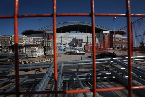 RUTH BONNEVILLE  / WINNIPEG FREE PRESS

Repair work being done at  Investors Group Field Tuesday.  
Photo of fenced off area in IGF west parking lot.

March 18, 2017