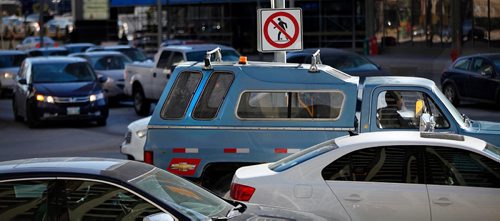 PHIL HOSSACK / WINNIPEG FREE PRESS  -  Portage and Main rush hour traffic, see story -  March 21, 2017