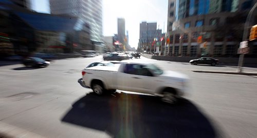 PHIL HOSSACK / WINNIPEG FREE PRESS  -  Portage and Main rush hour traffic, see story -  March 21, 2017
