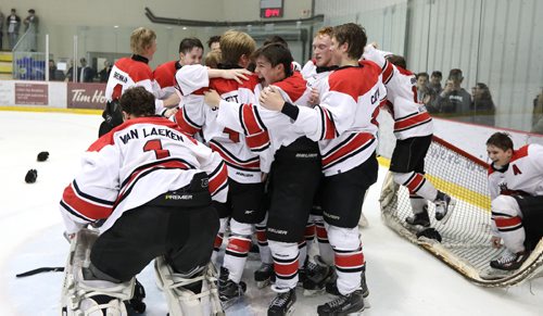 JASON HALSTEAD / WINNIPEG FREE PRESS

Winnipeg Monarchs players celebrate defeating the Winnipeg Warriors to win the AAA midget hockey city final on March 23, 2017 at the MTS Iceplex.