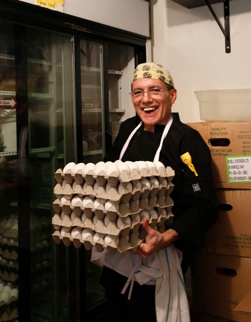 WAYNE GLOWACKI / WINNIPEG FREE PRESS

This City/Sunday.  Chef Frankie Domiter loads fresh eggs into the refrigerator at the Red Eye Diner, 3132 Main Street. David Sanderson story    March 24    2017