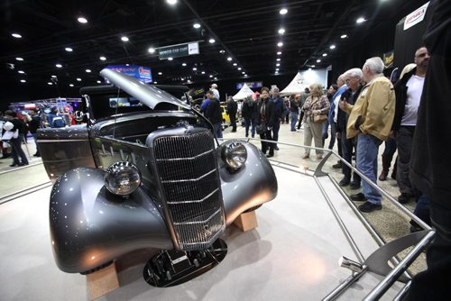 
RUTH BONNEVILLE  / WINNIPEG FREE PRESS

People check out Ron Seeeney's all steel 1935 Ford at the Car Show held at RBC Convention Centre Saturday. 
Standup photo 
March 25, 2017
