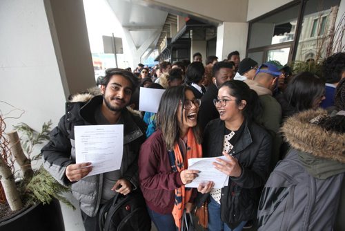 Ruth Bonneville  /  Winnipeg Free Press.


Ahad Prasla, Vasudha Kalia and Arshpreet Kaus (left to right) hold their resumes and shares some laughs as they wait with hundreds of others  outside the Delta Hotel to get into the Job Fair for the approx 1300 jobs opening at the new outlet mall across from Ikea, Saturday.  The hotel is only allowing a capacity of 300 people at a time in to the conference space as hundreds of people wait in line outside the hotel for their turn to be allowed in. One young man in his 20's with a degree says he's been applying everywhere and can't even find a job at a fast food outlet.

March 25, 2017