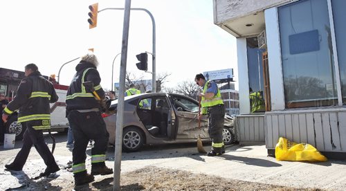 MIKE DEAL / WINNIPEG FREE PRESS

A vehicle sits on the sidewalk in front of Cafe ce Soir on Portage Avenue at Banning Street after two car collision Sunday afternoon. No word on injuries. 

170326
Sunday, March 26, 2017