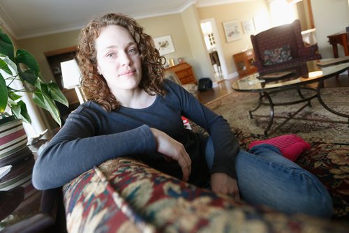 JOHN WOODS / WINNIPEG FREE PRESS
Kirsten Bourque, a registered nurse and mother of two who volunteers with the Street Feet program at Sunshine House, is photographed in her home Sunday, March 26, 2017. Street Feet is a foot health program offered to street-involved people during Sunshine Houses drop-in hours.
