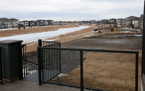 WAYNE GLOWACKI / WINNIPEG FREE PRESS

Homes.   The view from the back yard deck at 20 Clear Spring Road in Bridgwater Lakes. The KDR Homes sales rep Josie Garofoli. Todd Lewys story    March 27    2017