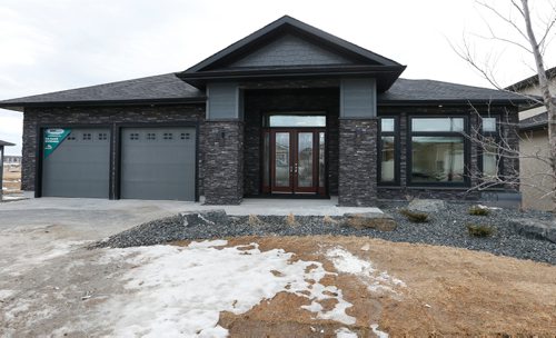 WAYNE GLOWACKI / WINNIPEG FREE PRESS

Homes.   20 Clear Spring Road in Bridgwater Lakes. The KDR Homes sales rep Josie Garofoli. Todd Lewys story    March 27    2017