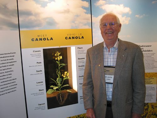Canstar Community News March 8, 2017 - Dr. Keith Downey, who is recognized as one of Canada's primary canola researchers, is shown next to the travelling exhibition highlighting canola's 50-year history. (ANDREA GEARY/CANSTAR COMMUNITY NEWS)