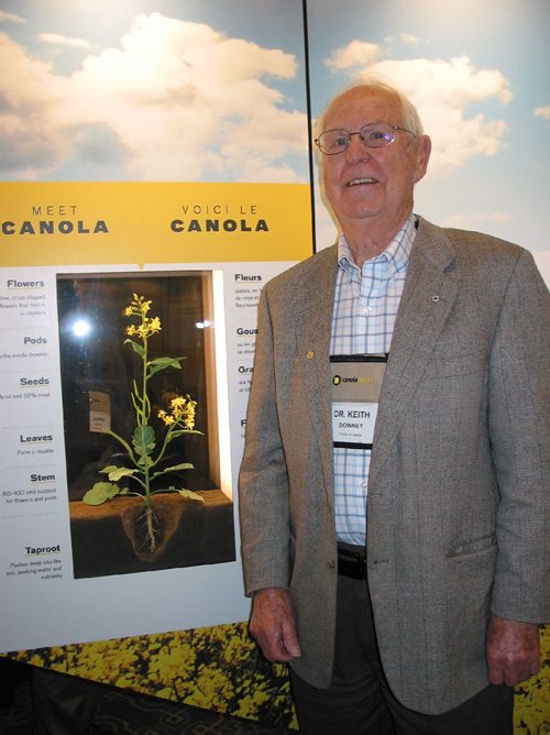 Canstar Community News March 8, 2017 - Dr. Keith Downey, who is recognized as one of Canada's primary canola researchers, is shown next to the travelling exhibition highlighting canola's 50-year history. (ANDREA GEARY/CANSTAR COMMUNITY NEWS)