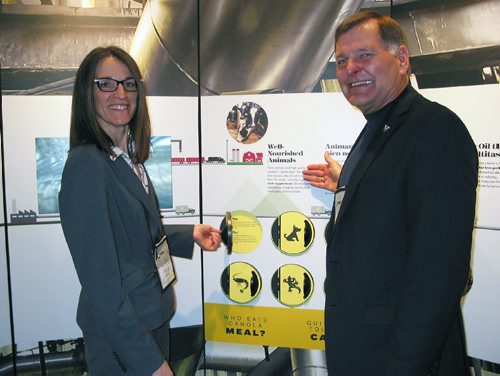 Canstar Community News March 8, 2017 - (From left) The Canola Council of Canada's communications manager Kelly Green and board president Jack Froese look at the canola exhibition during the Canola Council of Canada's recent Go for Gold conference in Winnipeg. (ANDREA GEARY/CANSTAR COMMUNITY NEWS)