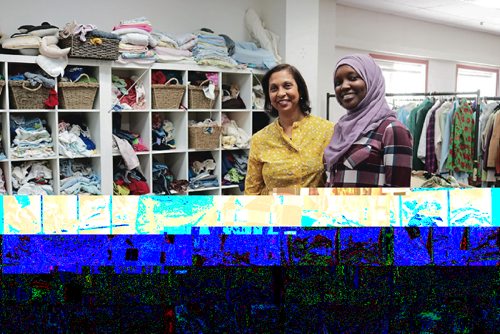 Canstar Community News Canadian Muslim Womens Institute president Yasmin Ali (left) and staff member Amita Mahmat (right) in front of the enourmous amount of donations they received in a week on Feb. 26, 2017.