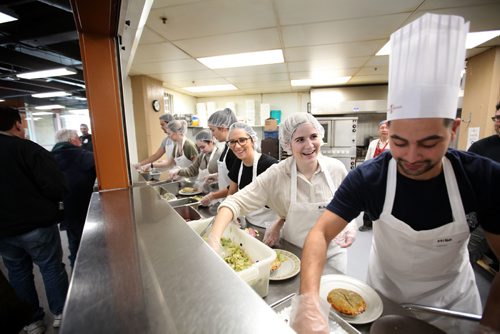 RUTH BONNEVILLE  / WINNIPEG FREE PRESS


Cup of Care, standup photos.
Joey Restaurant server, Mikaela Bauerlein shares some laughs with her co-workers (Mike Minenna - her left, Sevena Bevilacqua - her right), while serving up chicken pot pies for lunch for annual Cup of Care program at Siloam Mission Wednesday.  

JOEY Restaurants and its employee's partner with Siloam Mission for annual Cup of Care program serving up to 500 chicken-pot-pies made in their kitchens to patrons for lunch Wednesday and Thursday. 
Cup of Care is near and dear to our hearts. It`s a way we can all come together to support our communities and truly make an impact, said Chris Mills, Executive Chef of JOEY Restaurants. We will be serving over 6,000 chicken pot pies between all our regions based on community needs.  

March 29, 2017