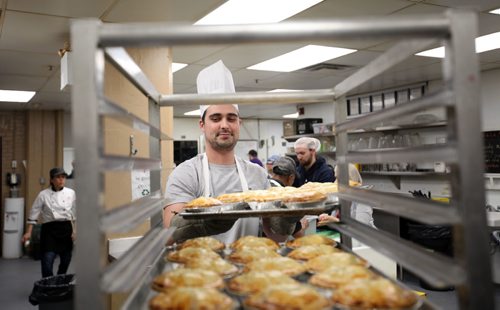 RUTH BONNEVILLE  / WINNIPEG FREE PRESS


Cup of Care, standup photos.

JOEY Restaurants  employee Sergio Masi takes trays of chicken pot pies from the oven that will be served up to patrons of Siloam Mission by a group of fellow employees of Joey Restaurants as they partner up  with Siloam Mission for annual Cup of Care program  lunch Wednesday.

Cup of Care is near and dear to our hearts. It`s a way we can all come together to support our communities and truly make an impact, said Chris Mills, Executive Chef of JOEY Restaurants. We will be serving over 6,000 chicken pot pies between all our regions based on community needs.  

March 29, 2017