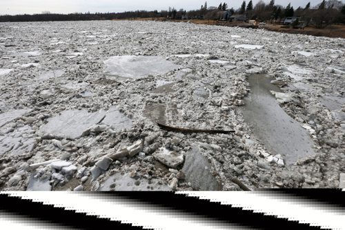 WAYNE GLOWACKI / WINNIPEG FREE PRESS

Ice started to flow under the Selkirk Bridge in Selkirk,Mb. Thursday afternoon. The bridge was closed to traffic Thursday as the Red River has flooded a section of Highway 204 just on the east side of the bridge. story March 30     2017