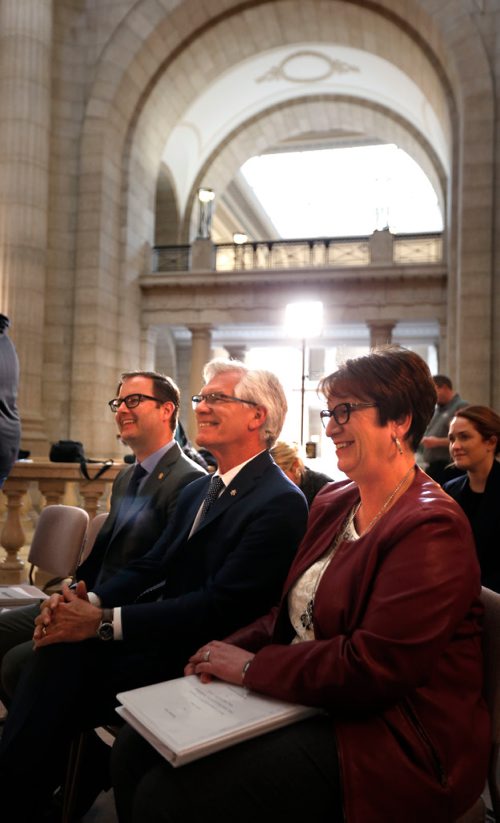 WAYNE GLOWACKI / WINNIPEG FREE PRESS

In centre, Jim Carr, Natural Resources Minister with Eileen Clarke,Indigenous and Municipal Relations Minister and Chris Goertzen, president, Association of Manitoba Municipalities for Manitoba public transit infrastructure funding announcement in the Rotunda in the Legislative Building Friday. Larry Kusch story  March 31     2017