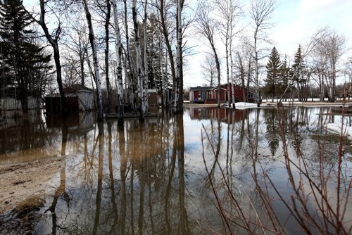 RUTH BONNEVILLE  / WINNIPEG FREE PRESS

Residences  and cottages along Murdoch Drive in Netley Creek have water on their property and surrounding their dwellings  due to Netley Creek flooding Saturday.


April 01, 2017
