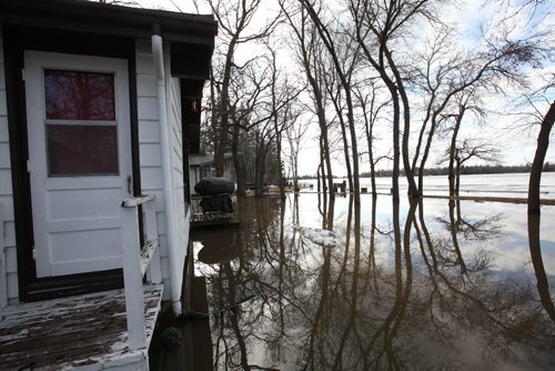 RUTH BONNEVILLE  / WINNIPEG FREE PRESS

Residences  and cottages along Murdoch Drive in Netley Creek have water on their property and surrounding their dwellings  due to Netley Creek flooding Saturday.


April 01, 2017