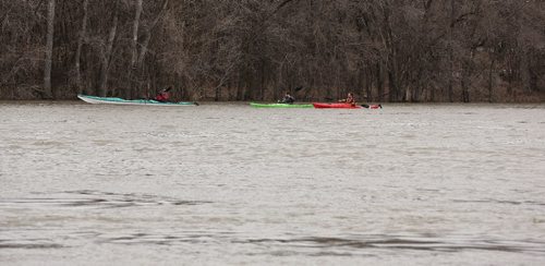 MIKE DEAL / WINNIPEG FREE PRESS

Kayakers follow the flow of the very high Red River close to the University of Manitoba Sunday afternoon. 
 
170402
Sunday, April 02, 2017