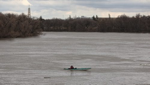 MIKE DEAL / WINNIPEG FREE PRESS

Kayakers follow the flow of the very high Red River close to the University of Manitoba Sunday afternoon. 
 
170402
Sunday, April 02, 2017