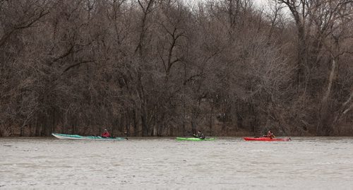 MIKE DEAL / WINNIPEG FREE PRESS

Kayakers follow the flow of the very high Red River close to the University of Manitoba Sunday afternoon. 
 
170402
Sunday, April 02, 2017