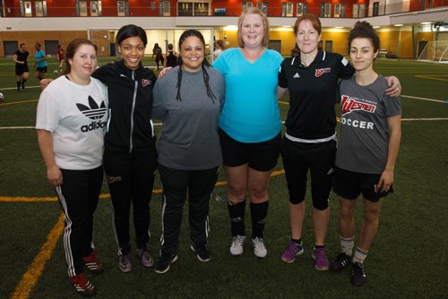 MIKE DEAL / WINNIPEG FREE PRESS
(From left) Cherianne McClure, Wesmen women's soccer team member Jamila Calvez, 20, Crystal Simmons, Heather Shayna a clinic participant, Head Coach Amy Anderson, and Wesmen women's soccer team member Rachel Antonia Dunsmore, 23, during a soccer clinic for women over 40 thats raising money for the Wesmen womens soccer team scholarship fund. 
170402 - Sunday, April 02, 2017.