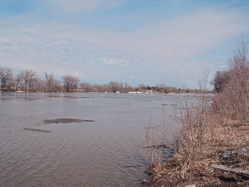Canstar Community News March 29, 2017 - The Red River is rising at the Perimeter Highway, just west of Henderson Highway. (SHELDON BIRNIE/CANSTAR/THE HERALD)