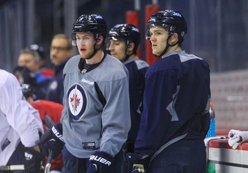 MIKE DEAL / WINNIPEG FREE PRESS
Winnipeg Jets' Jack Roslovic (52), right, and Andrew Copp (9) during practice at the MTS Centre Monday morning. 
170403
Monday, April 03, 2017