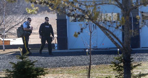 WAYNE GLOWACKI / WINNIPEG FREE PRESS

RCMP at the scene  of a home Tuesday morning on Cooks Cove in East Selkirk,Mb. where three bodies were found Monday night.  Ashley Prest  story April 4     2017