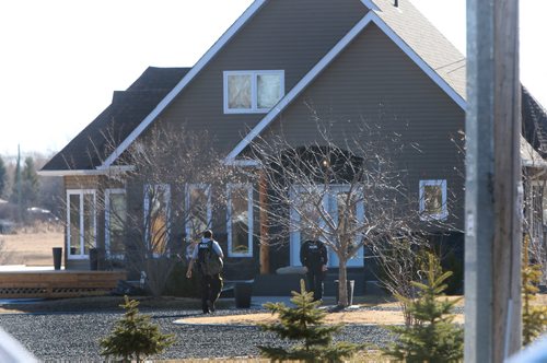 WAYNE GLOWACKI / WINNIPEG FREE PRESS

RCMP at the scene  of a home Tuesday morning on Cooks Cove in East Selkirk,Mb. where three bodies were found Monday night.  Ashley Prest  story April 4     2017