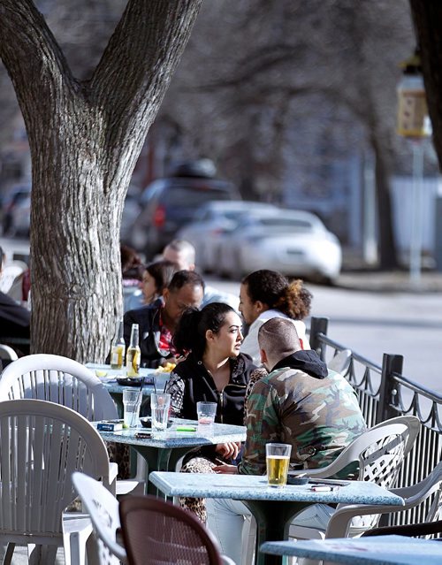 PHIL HOSSACK / WINNIPEG FREE PRESS  -  It's official.....Corydon ave Patio's hosted Winnipeggers Tuesday as sun and warmer temps thawed the city again. Forecast for tomorrow is a mix of sun and cloud with a high of 8C.  -  April 4, 2017