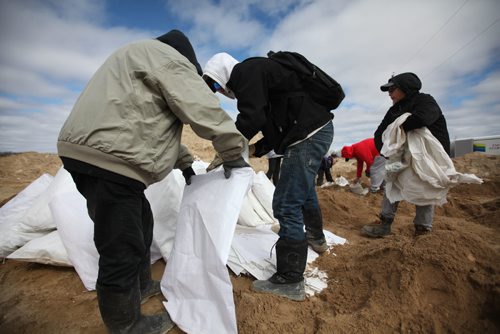RUTH BONNEVILLE  / WINNIPEG FREE PRESS

Feature on Peguis First Nation Feature on ongoing flooding issues.
Residents of Peguis start cleanup efforts as they unload sandbags to be emptied as water levels start to recede in area.
See Melissa Martin story.  
April 04, 2017