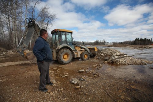 RUTH BONNEVILLE  / WINNIPEG FREE PRESS

Feature on Peguis First Nation Feature on ongoing flooding issues.
 Will Sutherland who oversees flood protection in Peguis (also a resident) stands next to roadway that has been taken out by the Fisher River Tuesday.
See Melissa Martin story.

April 04, 2017