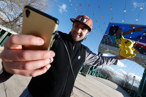 JOHN WOODS / WINNIPEG FREE PRESS
Angelo Zaglaris was out playing Pokemon with his Pikachu at the Forks Tuesday, April 4, 2017. Winnipeggers got out to enjoy the warm weather today.