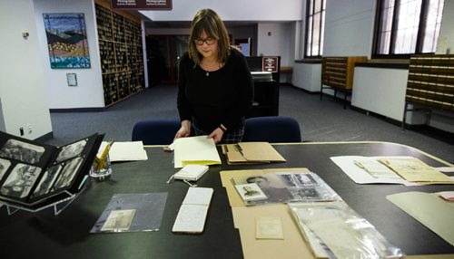 MIKE DEAL / WINNIPEG FREE PRESS
Kathleen Epp, senior archivist looks through some of the items that will be on display next Wednesday.
On Wednesday, April 12, the Archives of Manitoba will be holding an open house to commemorate the 100th Anniversary of The Battle of Vimy Ridge by putting on display many letters and paper documents that have found their way into the archives collection.
170405 - Wednesday, April 05, 2017.