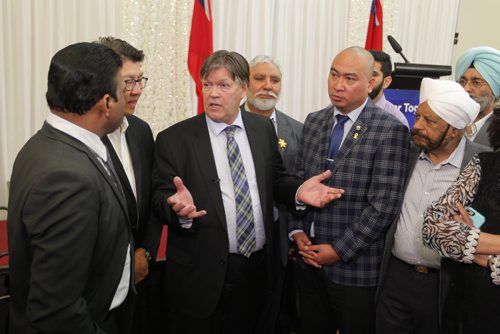BORIS MINKEVICH / WINNIPEG FREE PRESS
Manitoba Provincial nominee Program announcement at Punjab Cultural Centre, 1770 King Edward St.
Third from the left, Education and Training Minister Ian Wishart talks to people with more questions after the announcement. CAROL SANDERS STORY. April 6, 2017 170406