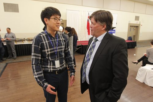 BORIS MINKEVICH / WINNIPEG FREE PRESS
Manitoba Provincial nominee Program announcement at Punjab Cultural Centre, 1770 King Edward Street. From left, Tong Shu, engineer-in-training, Manitoba Hydro and University of Manitoba graduate and Education and Training Minister Ian Wishart. CAROL SANDERS STORY. April 6, 2017 170406