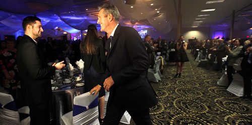 PHIL HOSSACK / WINNIPEG FREE PRESS  -   Premier Brian Pallister makes his way towards the stage as he and his caucus are presented to a packed fundraiser Thursday evening at the Victoria Inn Conference Centre. Alex Paul story.    -  April 6, 2017