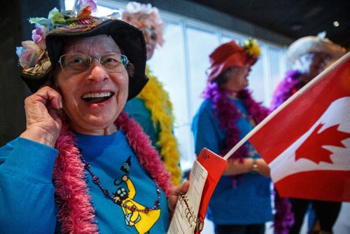 MIKE DEAL / WINNIPEG FREE PRESS
Freda Knott from Victoria laughs after starting a chant while waiting for the opening of the Raging Grannies exhibit at the CMHR.
A new exhibit opened Friday at the Canadian Museum of Human Rights which focuses on the original "gaggle" of Raging Grannies from Victoria, British Columbia. They are celebrating their 30th anniversary this year. A number of Raging Grannies flew in from Victoria to be a the opening of the exhibit. Joined by a few of the Winnipeg chapter they sang songs and paraded through the museum wearing their distinctive colourful shirts, hats, and boas.
170407 - Friday, April 07, 2017.