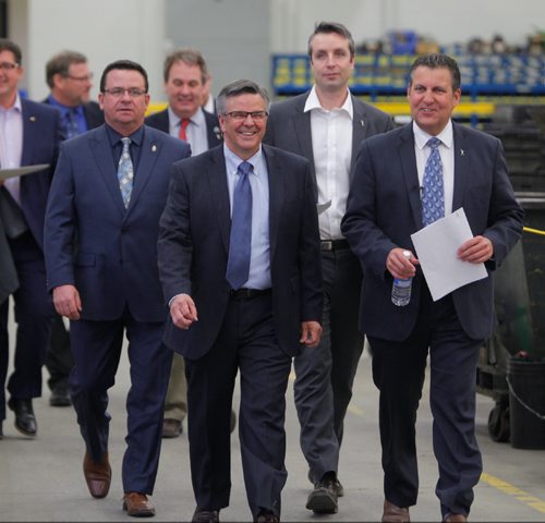 BORIS MINKEVICH / WINNIPEG FREE PRESS
Canadian Free Trade Agreement announcement at Monarch Industries, 51 Burmac Rd. From left/front 4 people, MLA Jeff Wharton, Roy Cook, CEO, Monarch Industries, and board member, Canadian Manufacturers and Exporters, MLA Andrew Smith, and Growth Enterprise and Trade Minister Cliff Cullen. April 7, 2017 170407