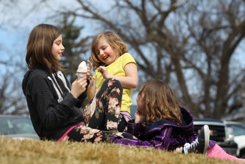 RUTH / BONNEVILLE WINNIPEG FREE PRESS

Sisters Jeri-Lynn 10yrs (left), Blaise - 5yrs (yellow) and Memphis - 8yrs (right), goof around together while having ice-cream at Bridge Drive-Inn BDI with their mom Saturday.
Standup photo


April 8, 2017